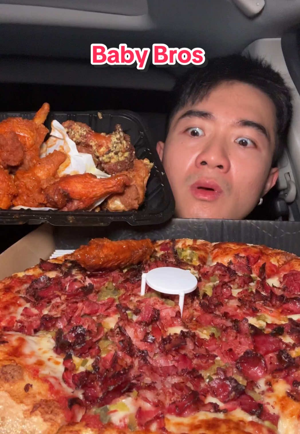 Eating pizza n wings in silence